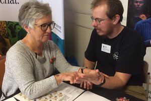 Deaf Interpreter Sandra and Able Australia client Jasper using deafblind fingerspelling