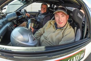Able client Harald and Peter Roberts in a Skyliner car