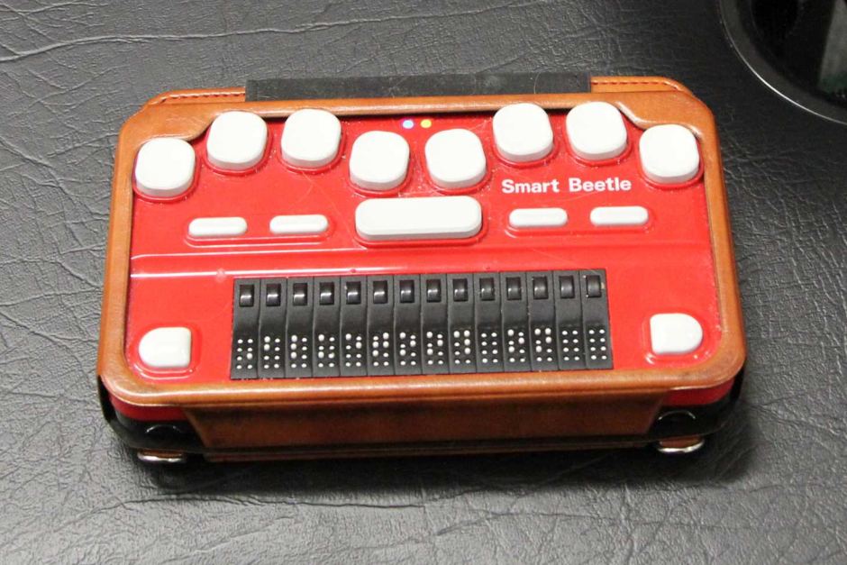 Red and White Smart Beetle Braille Machine