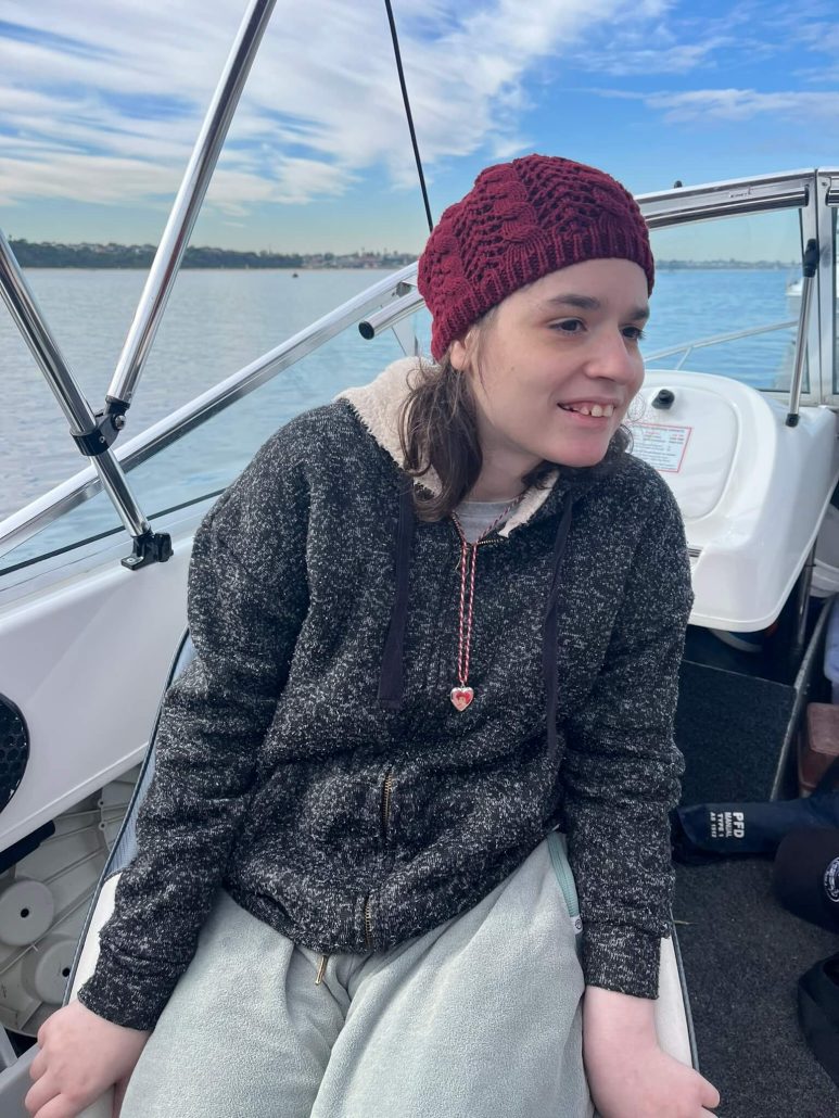 Rebekah sitting on the boat